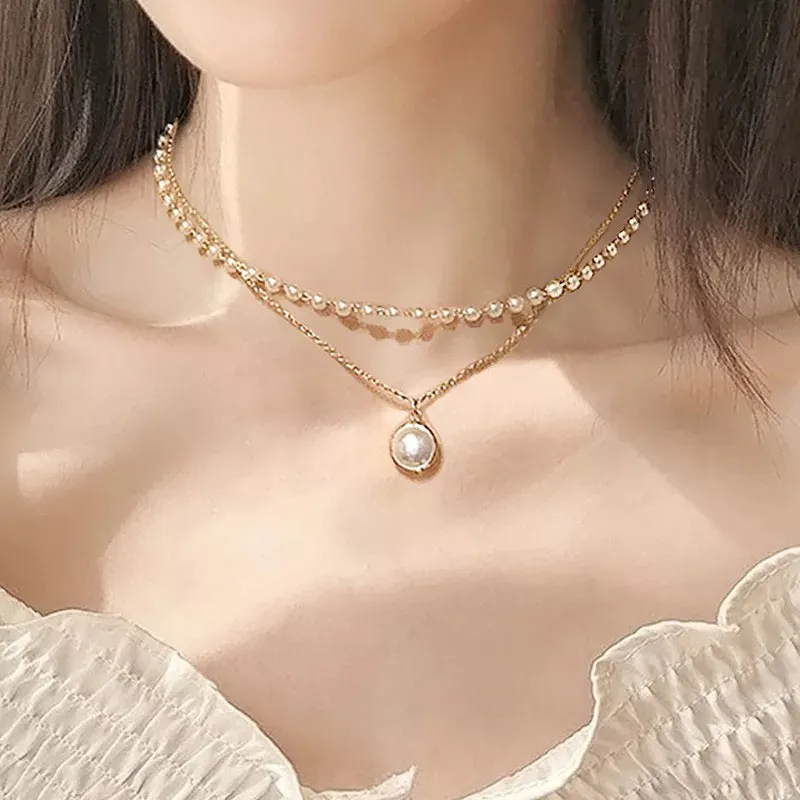 Pack Of 2 Layered Pearl Heart And Lock Pendant