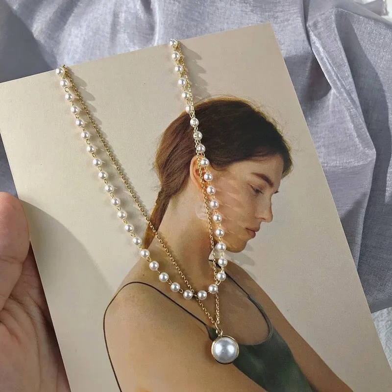Pack Of 2 Layered Pearl Heart And Lock Pendant